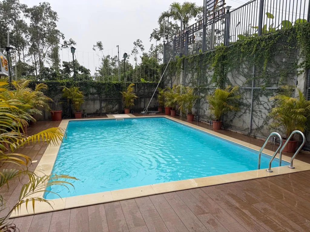 The pool deck below the main building
